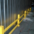 Fabricación de muro divisorio de 12 mts de alto x 90 mts de largo con barrera de protección en estructura de fierro.